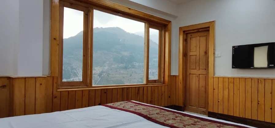 Windows looking over the mountain valley on the Sach Pass route