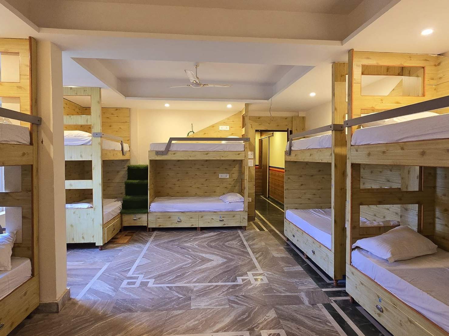 The Samdupling bunk room, with pine bunk beds for groups